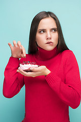 Image showing Beautiful women holding small cake. Birthday, holiday.