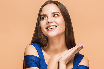 Image showing The young woman\'s portrait with happy emotions