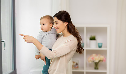 Image showing happy mother with little baby boy at home