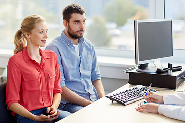 Image showing couple visiting doctor at family planning clinic