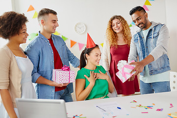 Image showing team greeting colleague at office birthday party