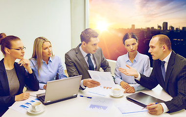 Image showing business team with laptop having discussion