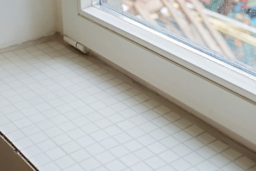 Image showing Window sill from mosaic tiles during renovation.