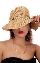 Image showing Mystery woman with straw hat