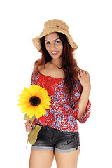 Image showing Beautiful woman with a sunflower