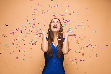 Image showing The woman celebrating birthday on brown background