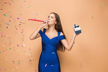 Image showing The woman celebrating birthday on brown background