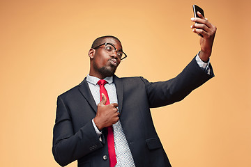 Image showing Young african business man on the phone