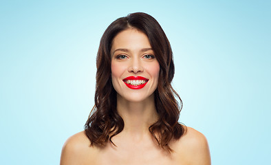 Image showing beautiful smiling young woman with red lipstick