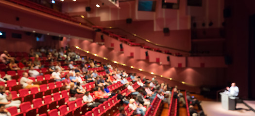 Image showing Business speaker giving a talk in conference hall.