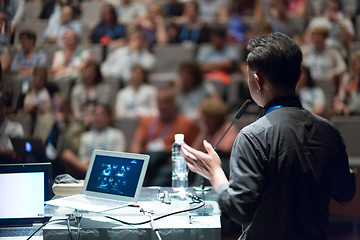 Image showing Public speaker giving talk at Business Event.