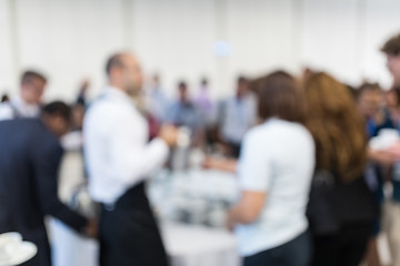 Image showing Blured image of businesspeople at coffee break at conference meeting.