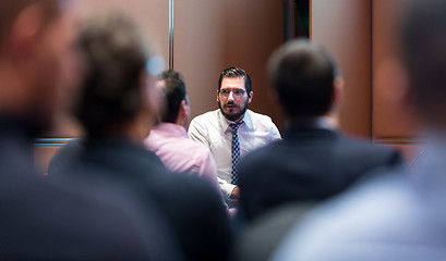 Image showing Skiled Businessman Presenting a Project to His Work Team atl Company Meeting.