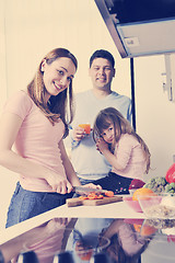 Image showing happy young family in kitchen