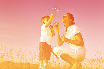 Image showing woman child bubble