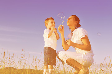 Image showing woman child bubble