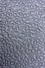 Image showing raindrops on metal