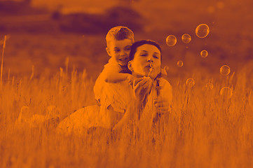 Image showing woman child bubble