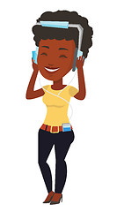 Image showing Young woman in headphones listening to music.