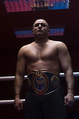 Image showing kick boxer with his championship belt