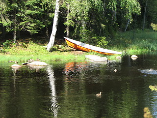 Image showing A boat and a river