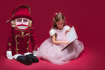 Image showing The beauty ballerina sitting with nutcracker