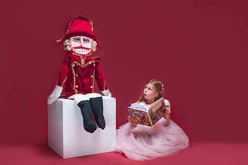 Image showing The beauty ballerina sitting with nutcracker