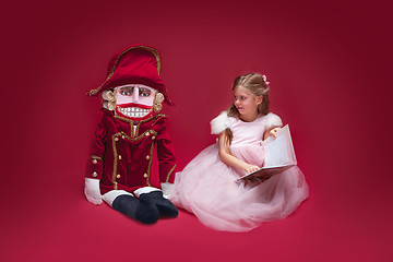 Image showing The beauty ballerina sitting with nutcracker