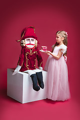 Image showing The beauty ballerina standing with nutcracker