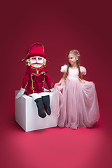 Image showing The beauty ballerina standing with nutcracker