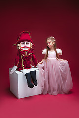 Image showing The beauty ballerina standing with nutcracker