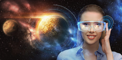 Image showing woman in virtual reality glasses over space