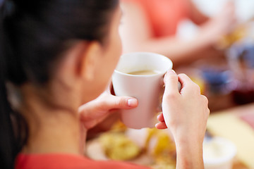 Image showing close up of woman with cup of coffee