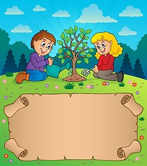 Image showing Small parchment and kids planting tree