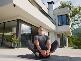 Image showing man doing morning yoga exercises