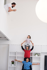 Image showing young boys posing line up piggyback