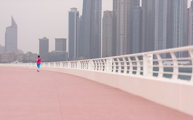 Image showing woman running on the promenade