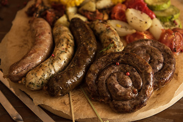 Image showing Grilled sausages with vegetables