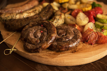 Image showing Grilled sausages with vegetables