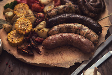 Image showing Grilled sausages with vegetables