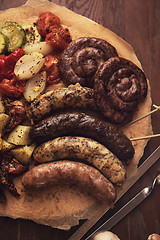 Image showing Grilled sausages with vegetables