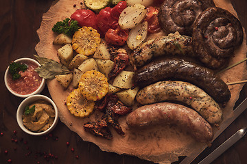 Image showing Grilled sausages with vegetables