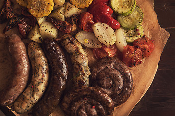 Image showing Grilled sausages with vegetables