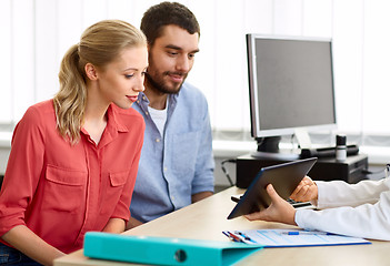 Image showing couple visiting doctor at family planning clinic