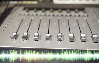 Image showing music mixing console at sound recording studio