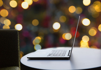 Image showing close up of laptop computer on table at christmas