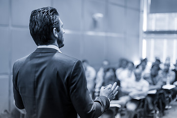 Image showing Speaker Giving a Talk at Business Meeting.