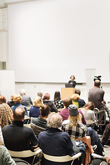 Image showing Woman giving presentation on business conference.