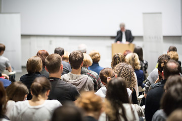 Image showing Business speaker giving a talk at business conference event.