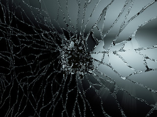 Image showing Pieces of destructed Shattered glass on black